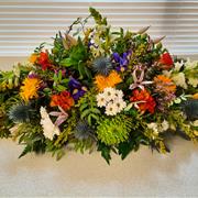 mixed flower coffin spray