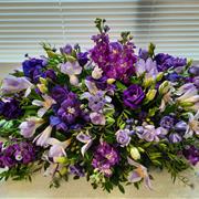 purple coffin spray